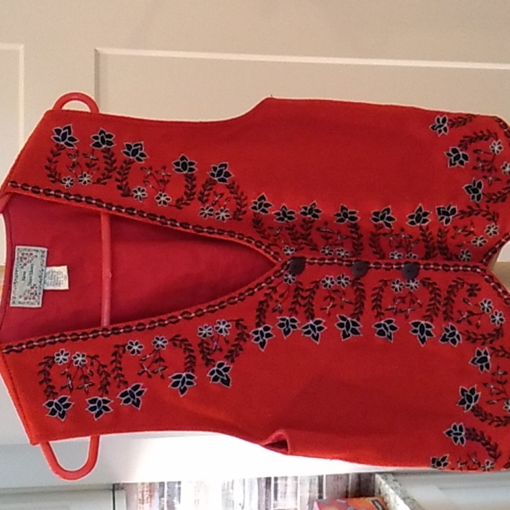Red wool Vest with black and white floral embroidery.  Women's size  M